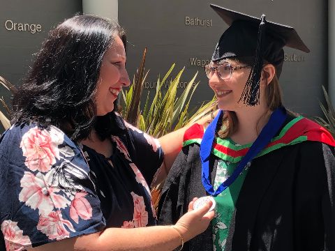 Charles Sturt graduate Winona Graham with her mother receiving the University Medal