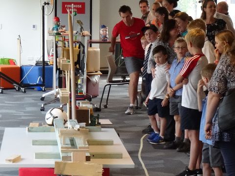 Visitors view the Rube Goldberg Machine