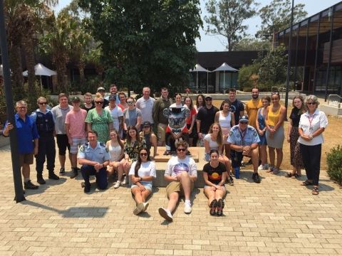 Students and academics from the ‘Crime Prevention International Summer School’ pictured with members of the NSW Police in Port Macquarie.